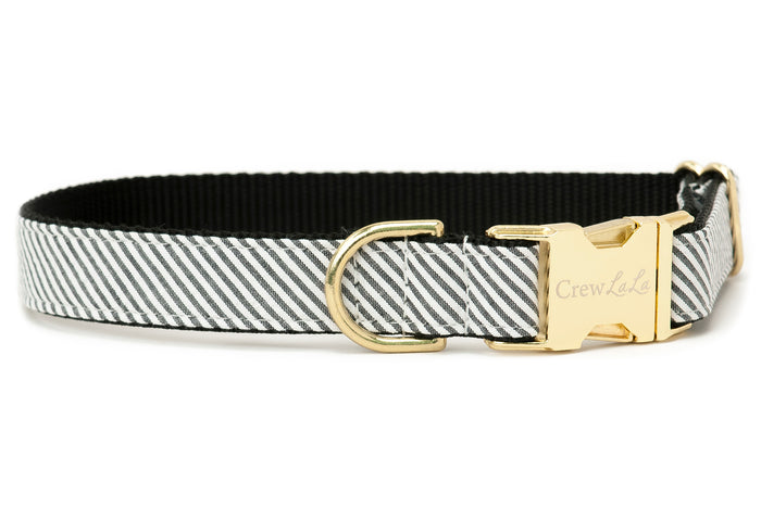A crisp black-and-white seersucker collar with subtle texture and luxe accents, blending Southern style with durable comfort for everyday wear.