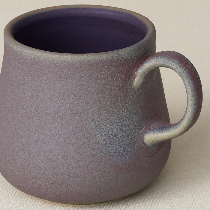 Close-up details of hand-thrown mug by Rookwood