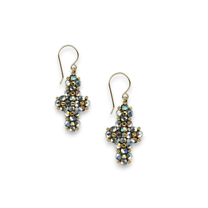 The MIGUEL ASES - PYRITE MIYUKI CROSS EARRINGS by MIGUEL ASES, INC. feature handcrafted dangling cross shapes with metallic and iridescent pyrite beads, finished with gold hooks—a stunning jewelry piece.