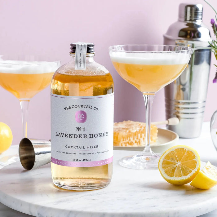 The YES COCKTAIL CO - GRENADINE comes in a brown glass bottle with a black label and descriptions like "tart," "floral," and "rich." With a metal cap, it's ideal for crafting vibrant cocktails, like a Tequila Sunrise.