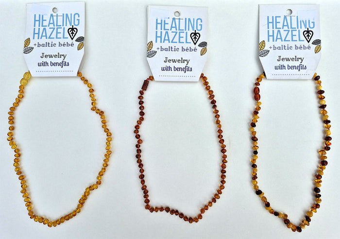 A comparison of three styles of adult size amber necklaces. 100 percent authentic Baltic amber.