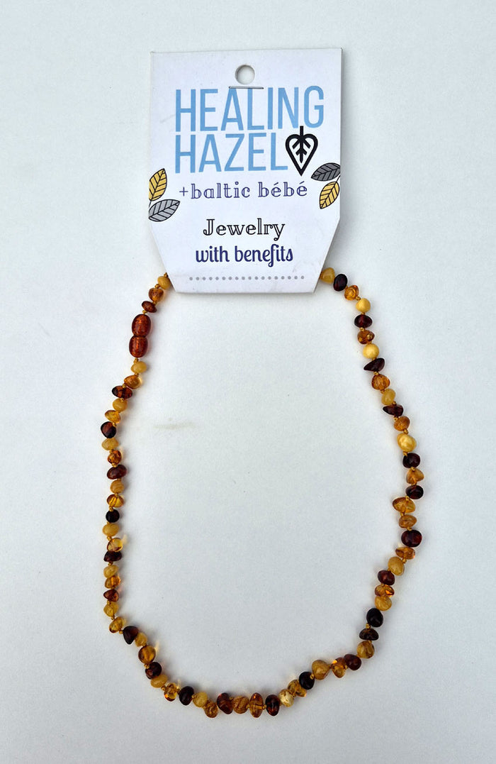 Handmade with 100% certified Baltic amber in a mix of honey, cognac, cherry and butter. Each amber bead is individually knotted into place to secure the beads and for safety in the event of breakage.