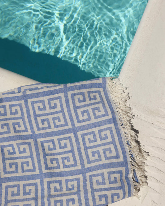 Blue and cream greek key meander cotton towel by a pool, Greek pestemal towel scarf pareo