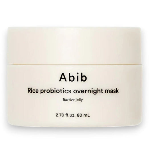 A white jar labeled "ABIB - RICE PROBIOTICS OVERNIGHT MASK BARRIER JELLY 80ML" from ASIAN BEAUTY WHOLESALE, shown on a plain white background; this hydrating sleep mask provides overnight moisture and probiotics for your skin.