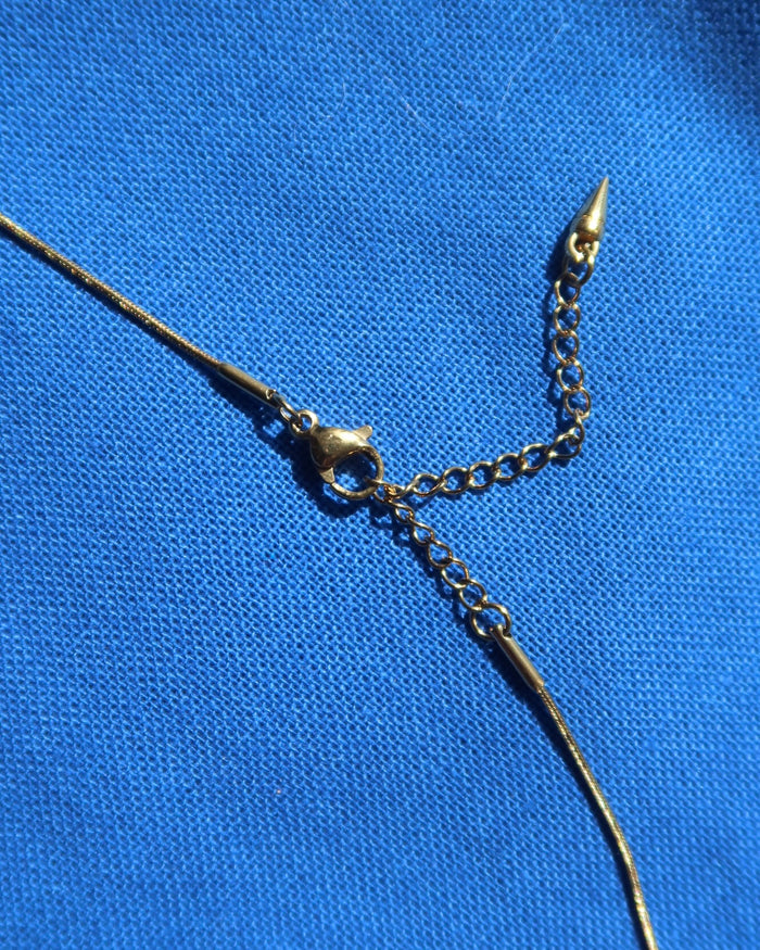 Necklace with extender and lobster claw clasp in gold color