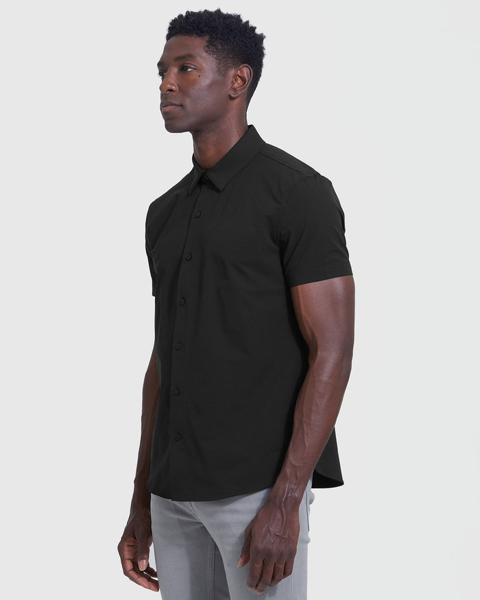 Black Commuter Short Sleeve Shirt on model with light-grey pants.