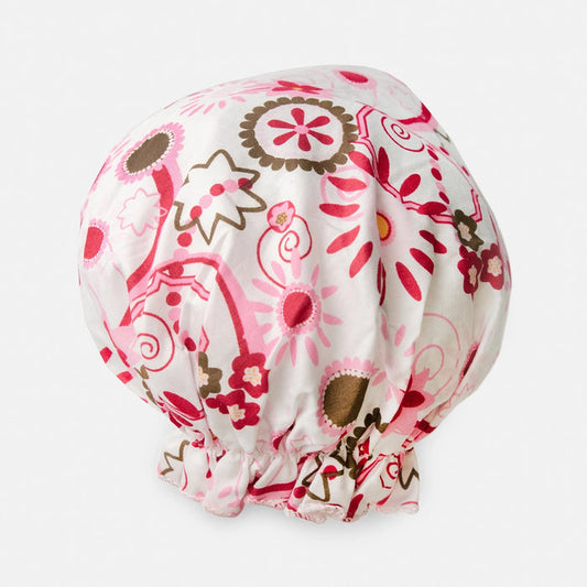 The BATH ACCESSORIES COMPANY BOUFFANT SHOWER CAP - BELLEZA features an elastic band and a pink, brown, and red floral pattern on a white background.
