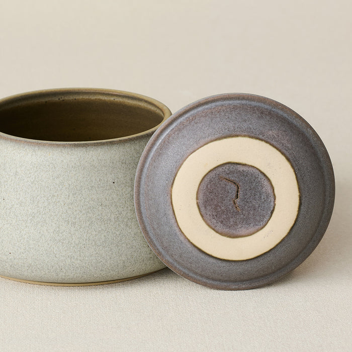 Close-up details of the one-of-a-kind canister.