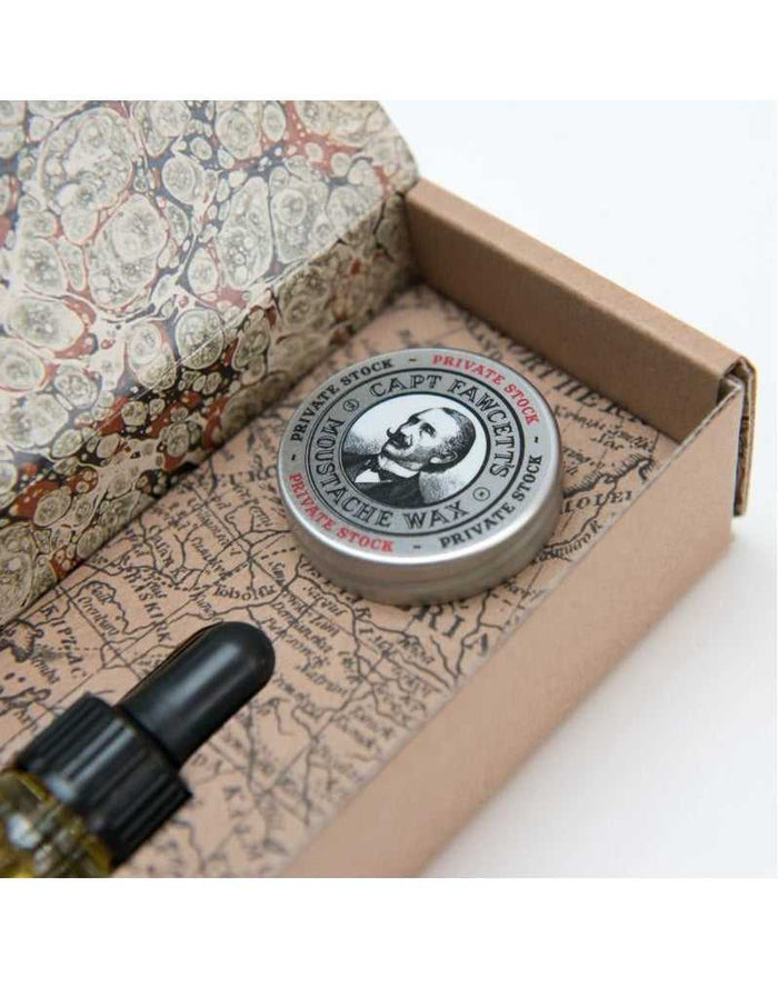 Beard grooming set with oil and wax in vintage-style packaging