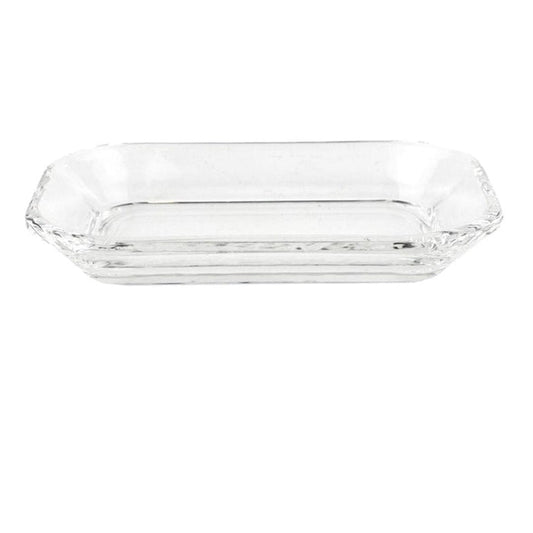 The HOMART CLEAR GLASS SOAP DISH is a rectangular tray with slightly raised sides and rounded corners, elegantly displayed on a white background.
