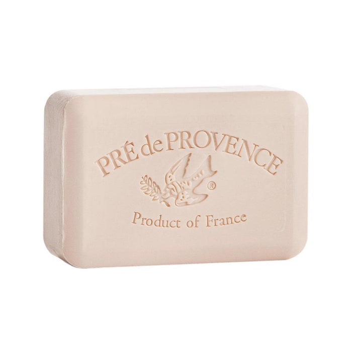 The EUROPEAN SOAPS, LLC COCONUT BAR SOAP 150G is a rectangular beige French soap with “PRÉ de PROVENCE” and “Product of France” engraved, plus a bird holding an olive branch. This shea butter soap provides a gentle, luxurious cleanse.
