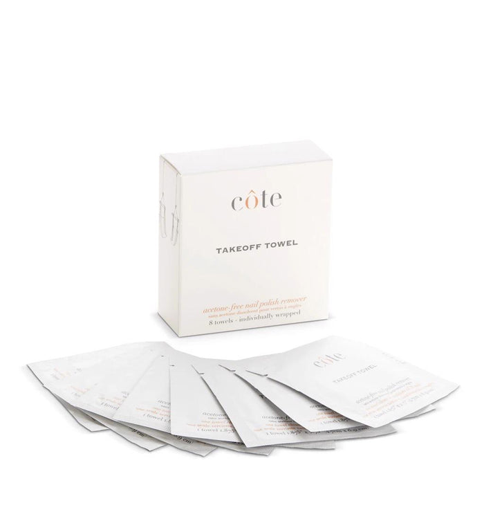 A COTE - TAKE OFF TOWELS - POLISH REMOVER box stands behind eight individually wrapped acetone-free remover towels by COTE, fanned out on a white background.