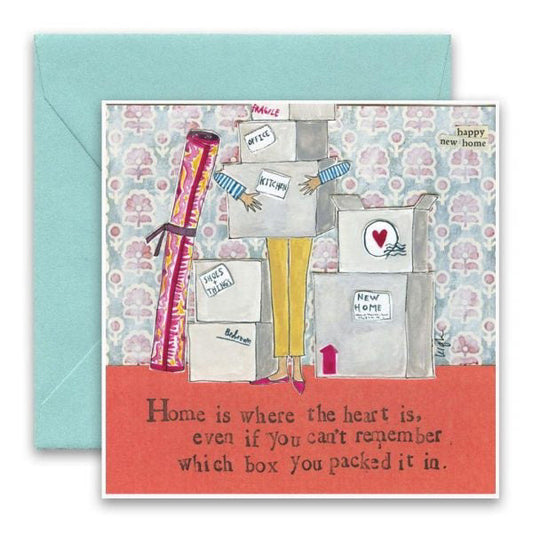 The CURLY GIRL DESIGNS - HOME IS WHERE CARD by CURLY GIRL DESIGN, INC features an illustrated mover with labeled boxes and the message: "Home is where the heart is, even if you can't remember which box you packed it in.