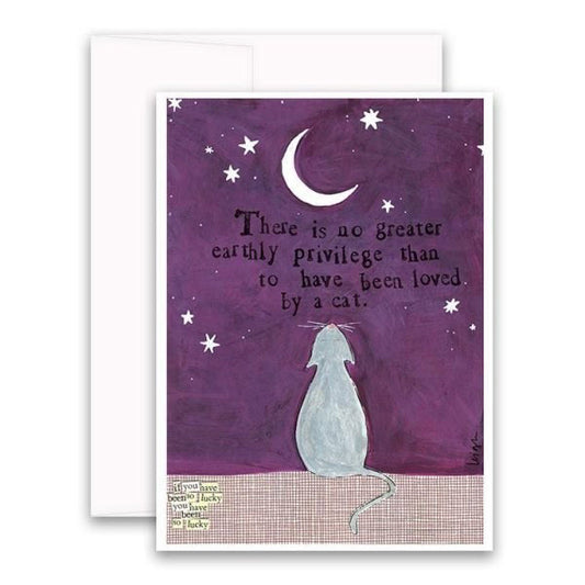 The CURLY GIRL DESIGNS - LOVED BY A CAT CARD by CURLY GIRL DESIGN, INC features a gray cat gazing at a crescent moon with the quote: "There is no greater earthly privilege than to have been loved by a cat." Ideal for any cat lover.
