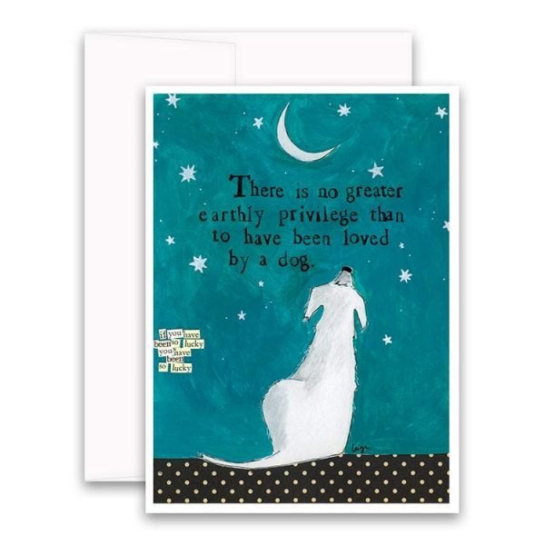 The CURLY GIRL DESIGNS - LOVED BY A DOG CARD by CURLY GIRL DESIGN, INC features art of a person hugging a large white dog under a crescent moon and stars, with the quote: "There is no greater earthly privilege than to have been loved by a dog.