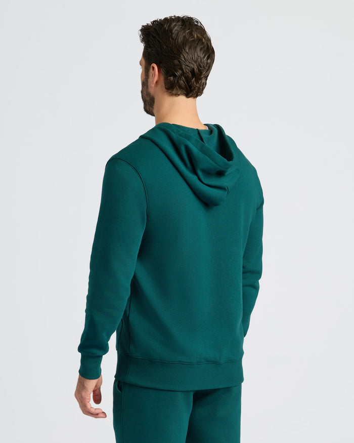 Man wearing Deep Emerald Full Zip Fleece Hoodie & Jogger 2-Pack.