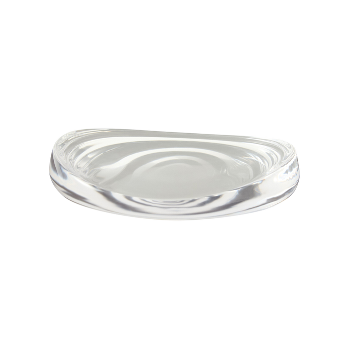 Clear Dune Bowl Small with a shallow asymmetrical form, thick transparent walls and softly rounded organic contours.