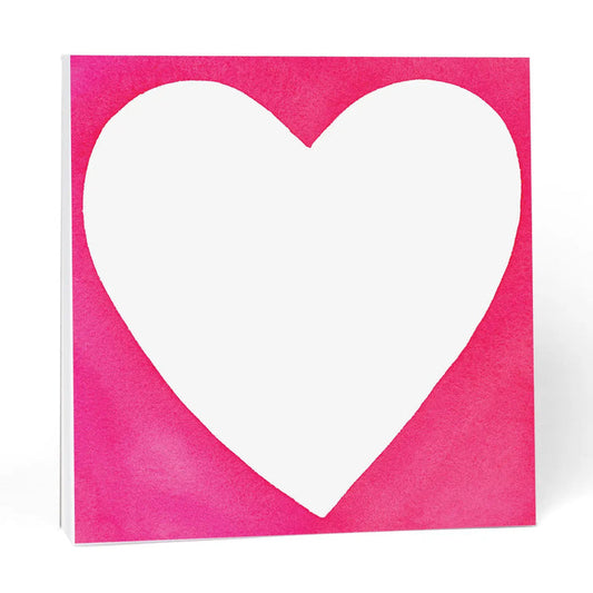 The E. FRANCES PAPER CHUBBY HEART NOTE PAD features a large white heart centered on a bright pink square background. Made in the USA, this charming and bold notepad is perfect for any occasion.