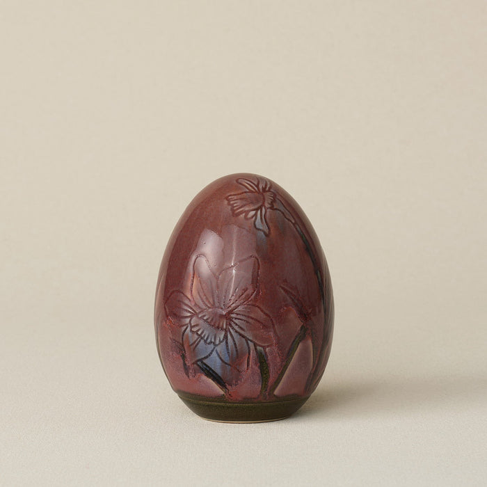 Handcrafted ceramic egg by Rookwood Pottery