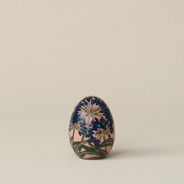 Handcrafted ceramic egg by Rookwood Pottery