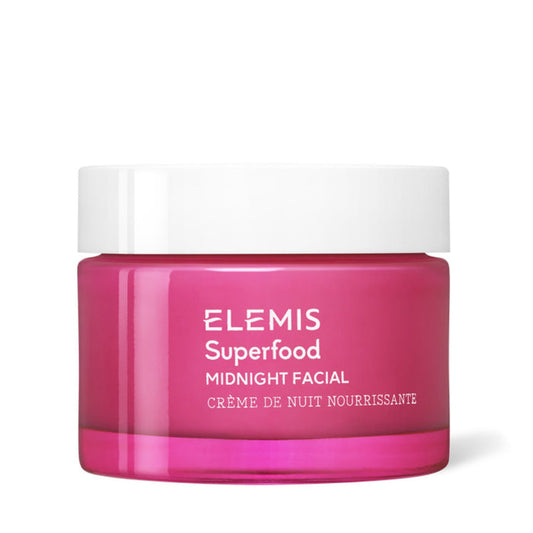 A pink jar of ELEMIS - SUPERFOOD MIDNIGHT FACIAL by ELEMIS - STEINER, featuring a white lid and "Crème de nuit nourrissante" on the front, is shown against a white background. This prebiotic sleeping cream offers overnight hydration.