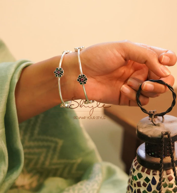 925 pure silver jadau flower bangle worn on model