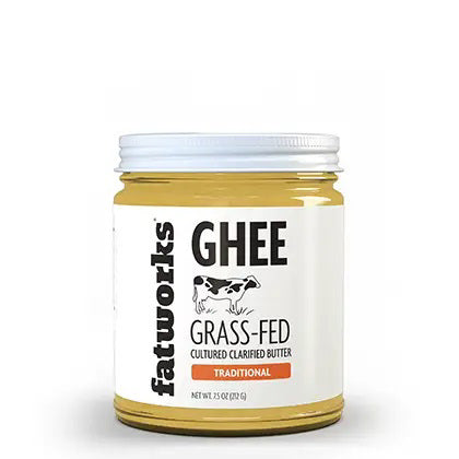 A 7.5-ounce (212-gram) jar of Fatworks brand Organic Cultured Ghee. The label reads "Organic Cultured Clarified Butter" and "Traditional." The jar features a white lid along with a design that includes an illustration of a cow and a red banner, making it keto and paleo friendly.