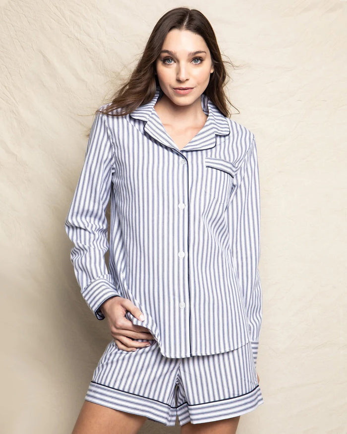 The PETITE PLUME FEARRINGTON LIFESTYLE COLLECTION Women’s Long Sleeve Twill Navy French Ticking Short Set features navy and white stripes, a front pocket with an embroidered black sheep, and signature Petite Plume label and tag.