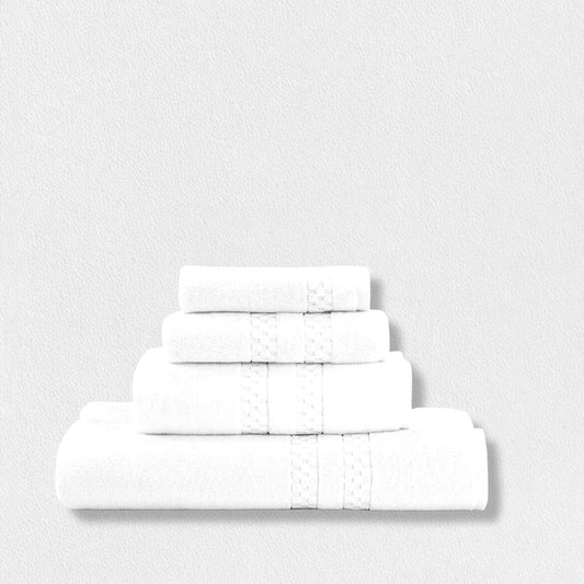 Four plush FEARRINGTON LIFESTYLE BATH SHEET towels by Frette North America are neatly stacked from smallest to largest against a plain white background.