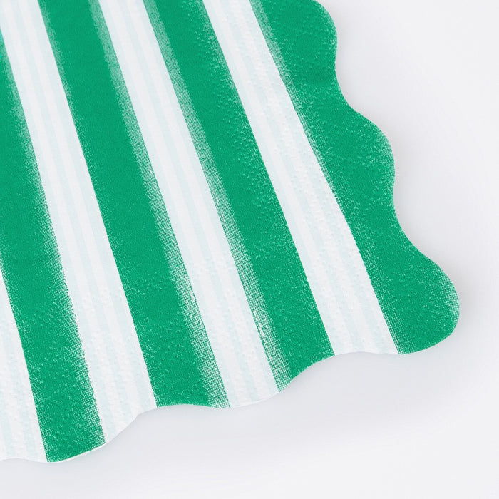 Close-up of green and white striped paper napkin.