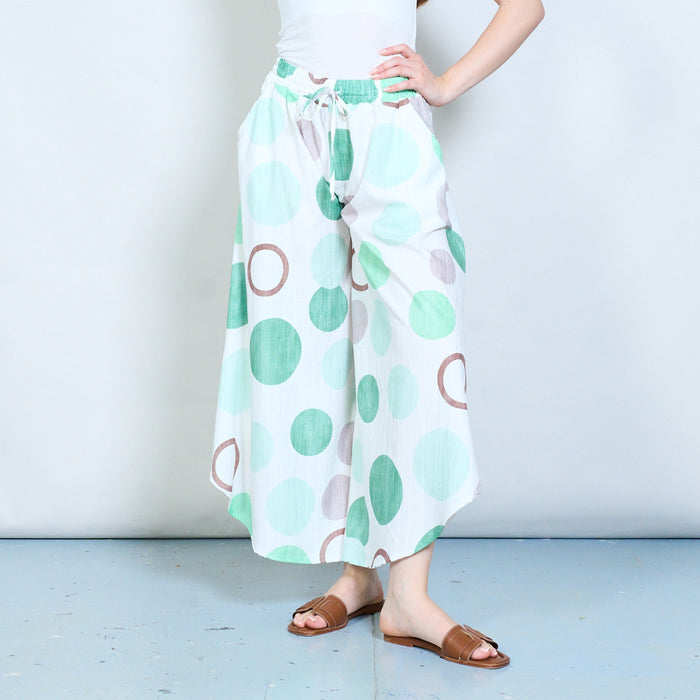 Flowing abstract circle print wide leg trousers with drawstring waist wholesale