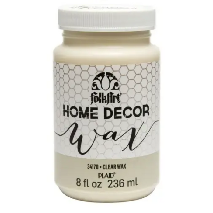 An 8 fl oz jar of Folk Art Home Decor Wax in Clear Wax (color 34170). The product is shown in a white plastic jar with a white screw cap and a white label featuring a honeycomb pattern and black text.