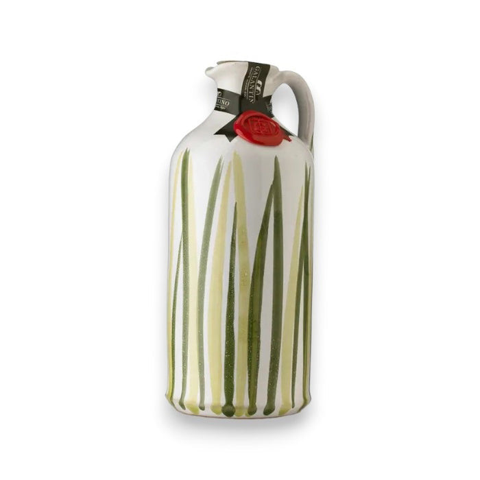 The GALLANTINO - EXTRA VIRGIN OLIVE OIL by ZIA PIA IMPORTS comes in a tall, hand-painted ceramic jug with a handle, featuring vertical green lines and a red wax seal, inspired by the tradition of Puglia, Italy.