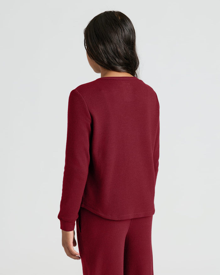 Girls Dark Maroon Waffle Long Sleeve Henley & Waffle Leg Pants worn from back.