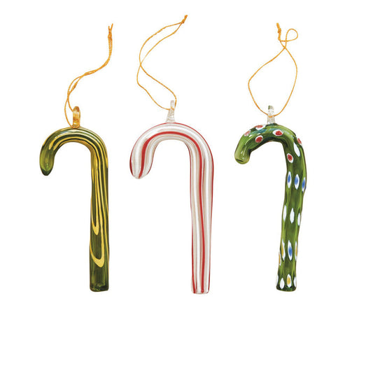 The CREATIVE COOP GLASS CANDY CANE ORNAMENT set features three festive styles—green with yellow swirls, white with red stripes, and green with colorful dots—all with hanging loops, perfect for holiday decorating.