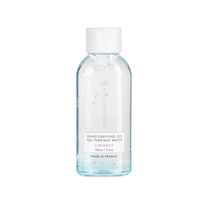 A clear plastic bottle with a white cap contains transparent HAND PURIFYING GEL - COCONUT by EUROPEAN SOAPS, LLC, labeled "70% alcohol, 100ml / 3.4oz, Made in France.