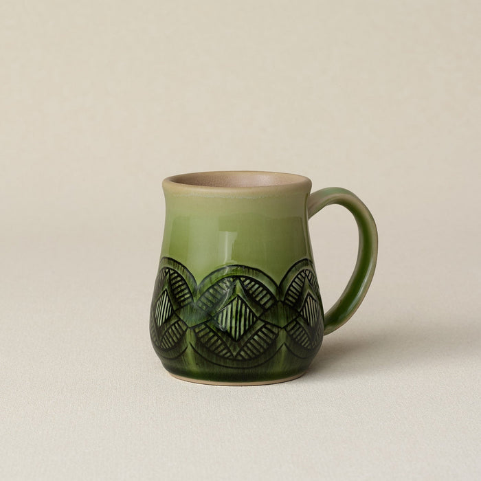 Hand-thrown ceramic mug by Rookwood Pottery