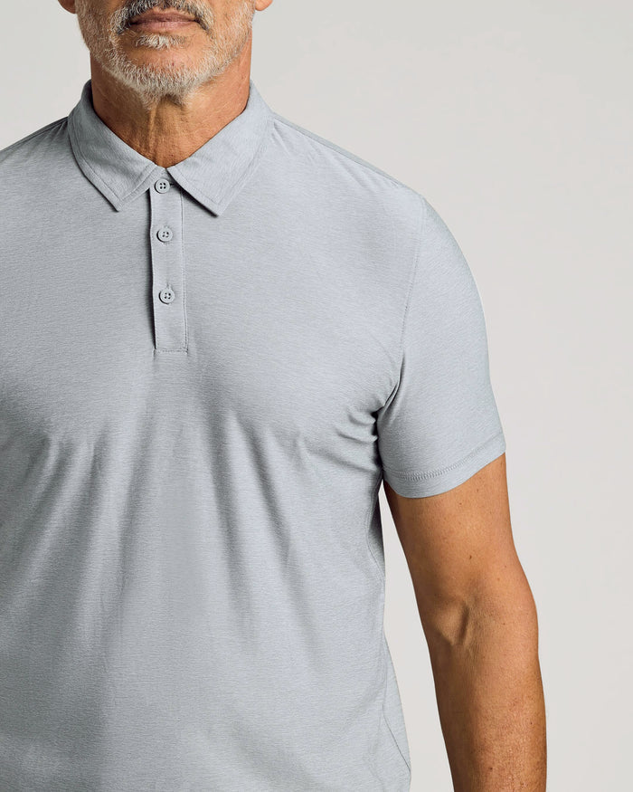 Heather Light Gray Active Polo on man with salt-and-pepper beard.