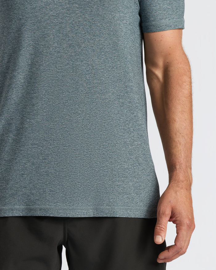 Heather Navy Active Crew Neck Tee worn with black athletic shorts.