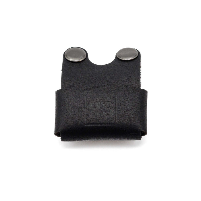 Close-up of black leather razor cover