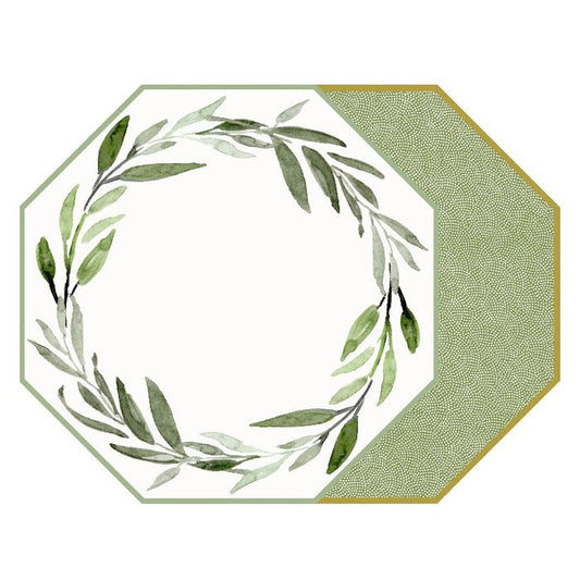 An octagonal HOLLY STUART DESIGNS placemat in Saxon Green features watercolor leaves forming a wreath on white, with a textured green and gold section accenting the right side.