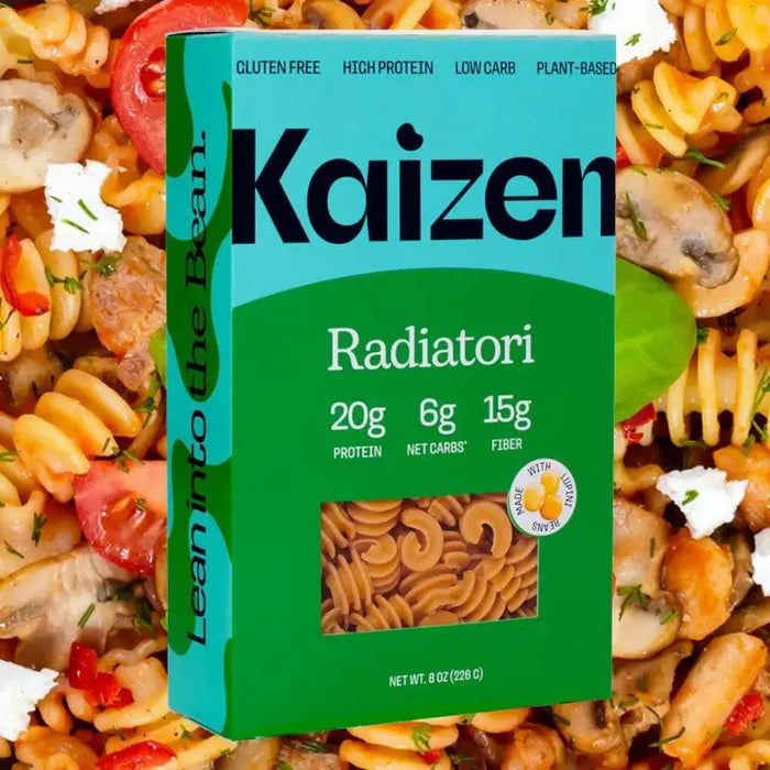 A box of KAIZEN - RADIATORI PASTA by KAIZEN FOOD COMPANY, labeled gluten free, low carb, and plant-based. The front shows 20g protein, 6g net carbs, and 15g fiber per serving.