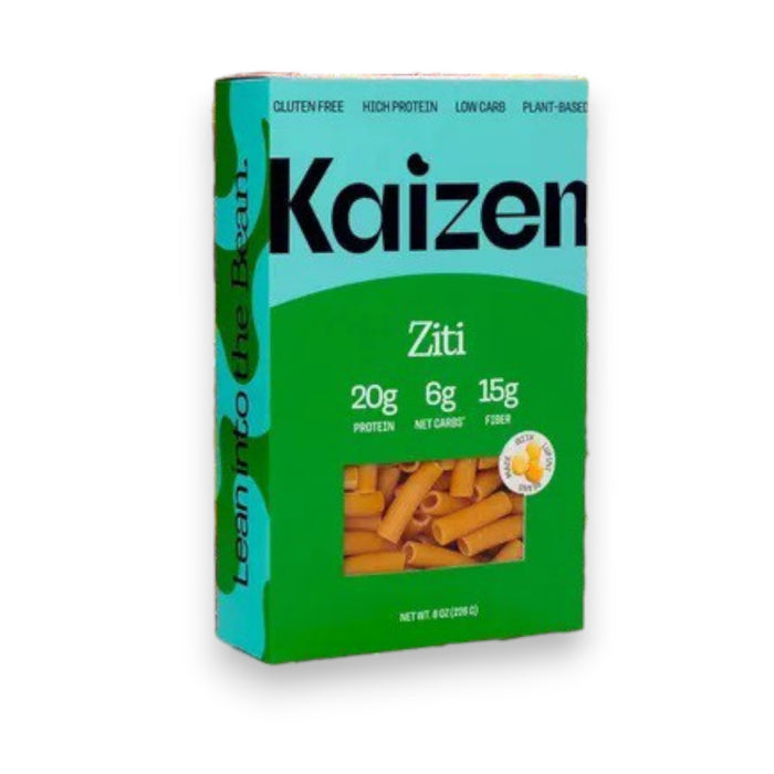 A box of KAIZEN brand Ziti pasta. The turquoise and green box, adorned with "KAIZEN FOOD COMPANY" in bold black letters and "Ziti" in white, highlights attributes like "Gluten-Free," "High-Protein," "Low-Carb," and "Plant-Based." Inside is the gluten-free pasta, clearly visible through the packaging.