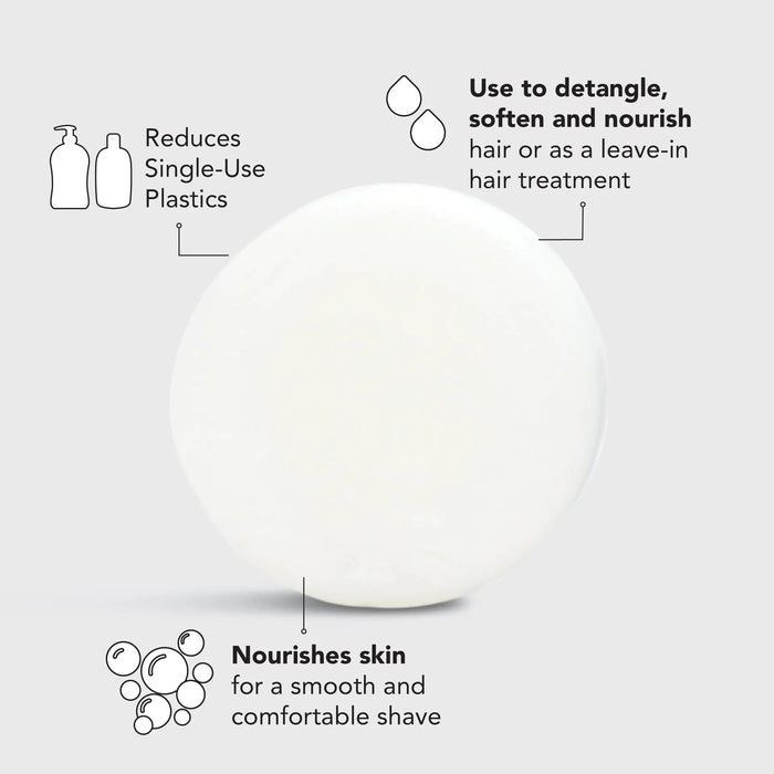 A white, multi-purpose solid conditioner and shave bar sits on a blue box labeled "KITSCH - ULTRA SENSITIVE CONDITIONER & SHAVE BAR." Formulated without color or fragrance, it features icons indicating it's color safe, pH balanced, vegan, and environmentally friendly.