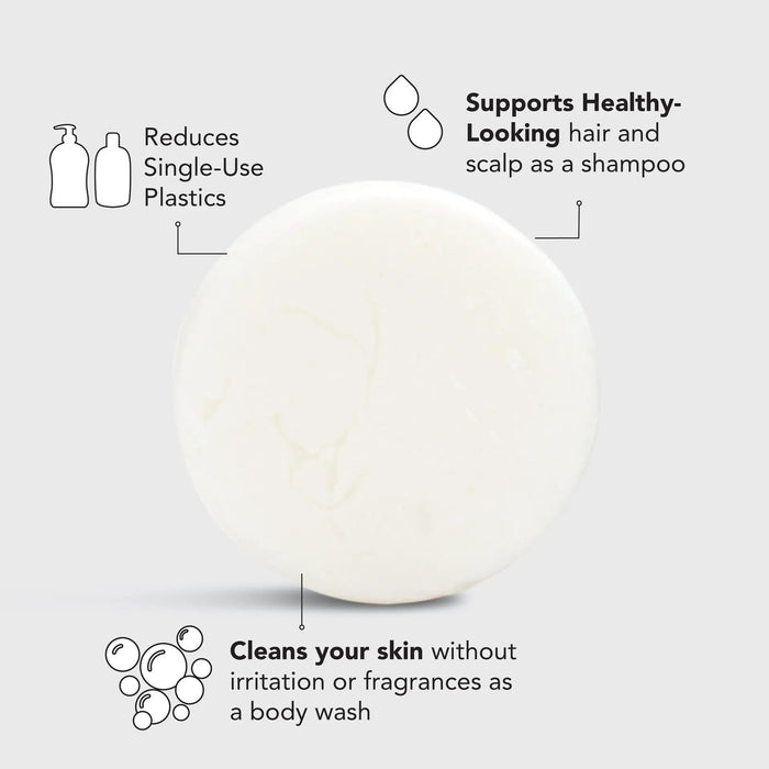 A round, cream-colored cleansing bar sits on a blue box labeled "KITSCH Ultra Sensitive Shampoo & Body Wash Bar." Packaging highlights include "4ocean Certified Cleanup Partner," "formulated without color or fragrance," "color safe," "pH balanced," and "vegan.