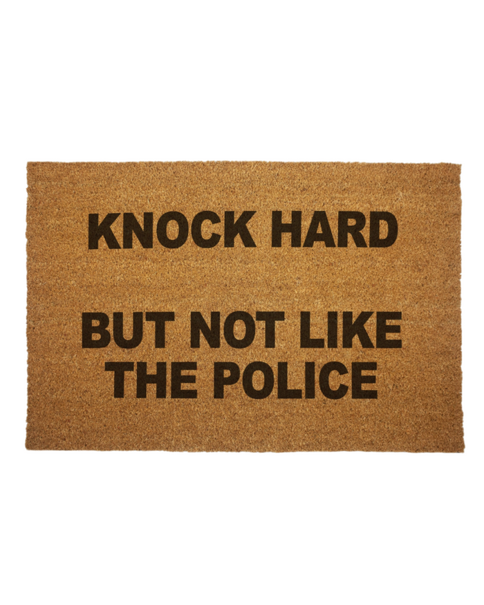 Knock Hard but not like the police door mat by Shady front sold by Le Monkey House