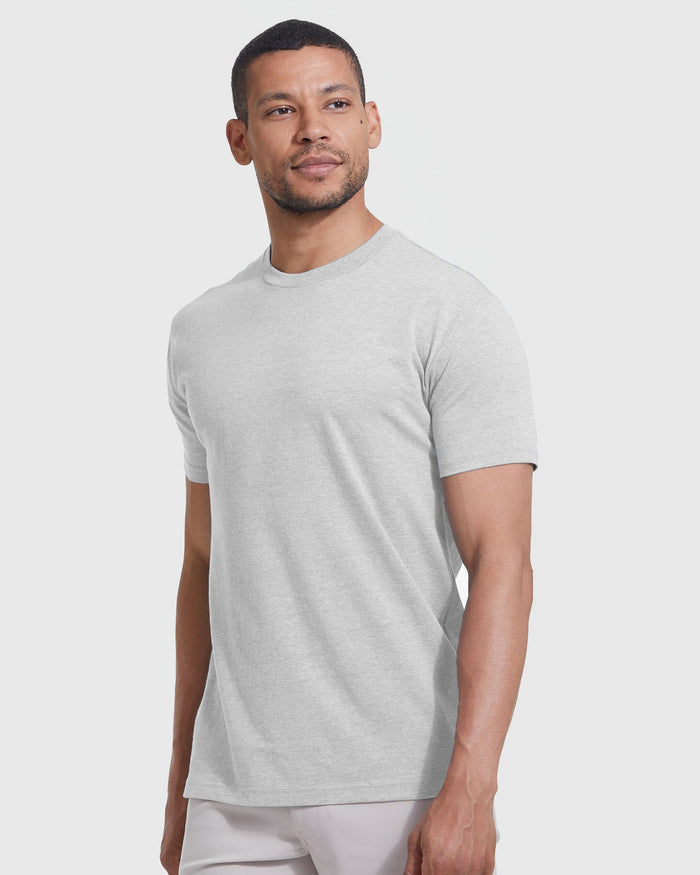 Man in Light Heather Gray Classic Crew Neck T-shirt.