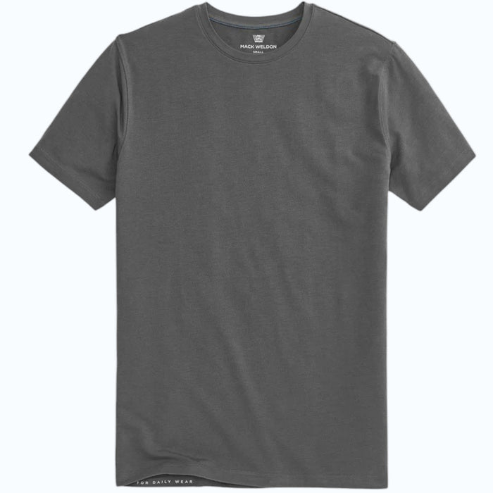 A man with short dark hair and a beard wears a MACK WELDON SILVER CREW NECK T-SHIRT and a black watch, standing against a light gray background with a neutral expression.
