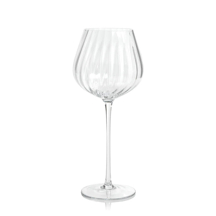 The ZODAX MADELEINE OPTIC RED WINE GLASS is a clear, 580 ml glass with a long stem and wide textured bowl, displayed against a plain white background.