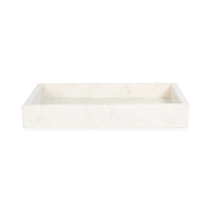 A collection of solid marble countertop pieces with a matte finish.
